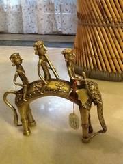 3 men on elephant